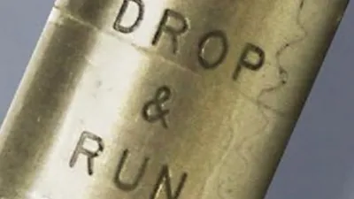 Metal tube labeled drop & run
