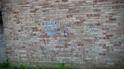 A brick wall which (presumably) some kids have been writing messages on in chalk, they’re mostly on the likes of “Jaddy was here!” although one just says “I miss my ex #comeback”