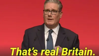 Kier Starmer at a podium with the caption “That’s real Britain”